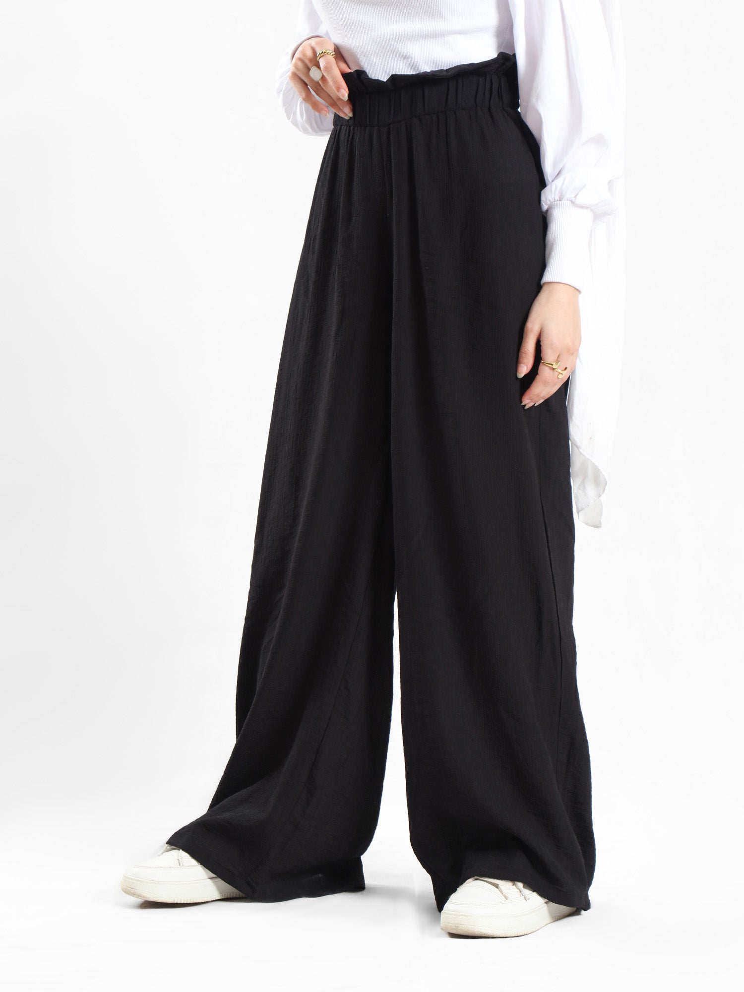 Effortless Bloom Pants in ripped viscose-cotton blend with relaxed wide-leg cut, offering breathable comfort for laid-back summer style
