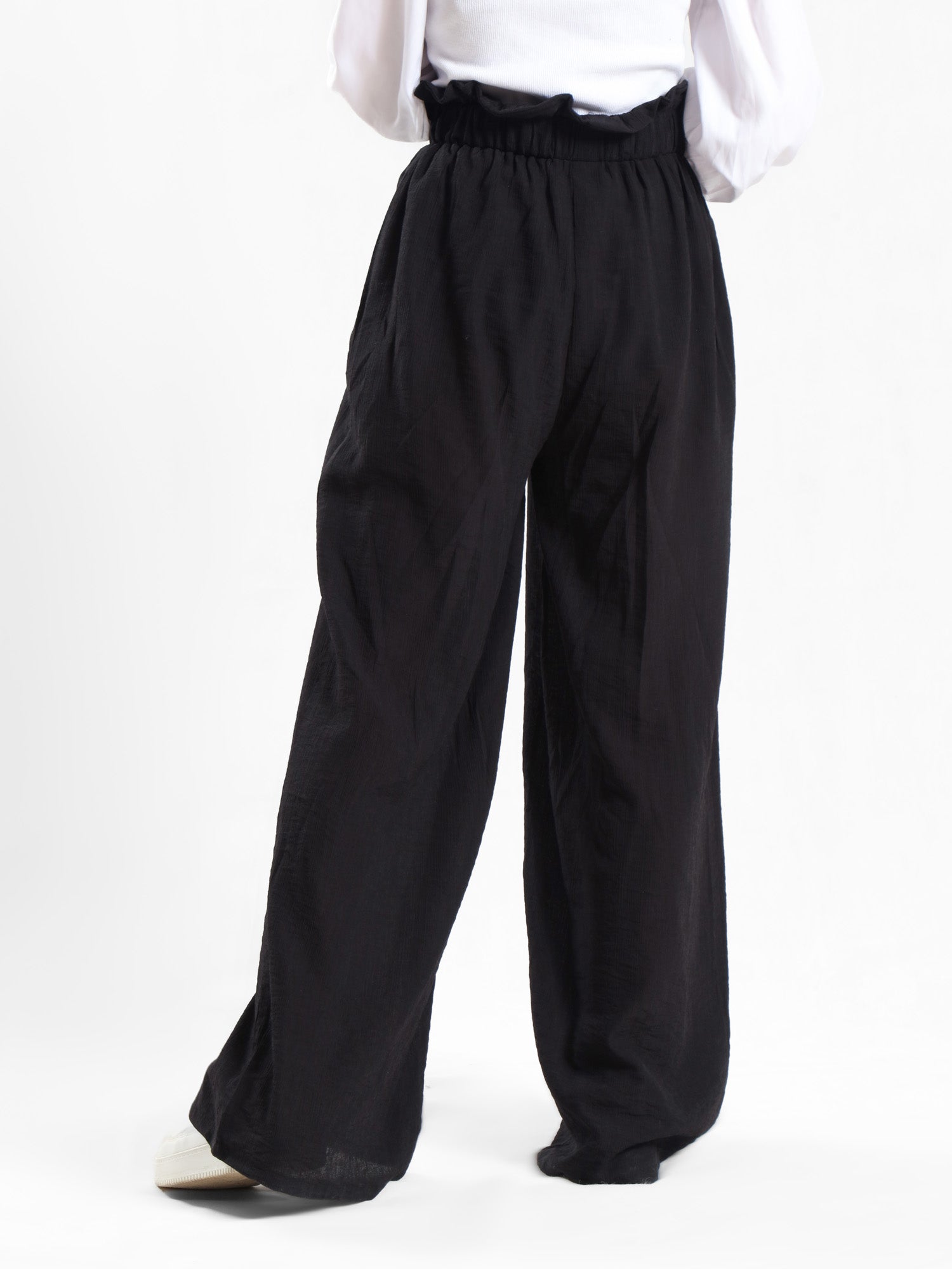 Effortless Bloom Pants in ripped viscose-cotton blend with relaxed wide-leg cut, offering breathable comfort for laid-back summer style