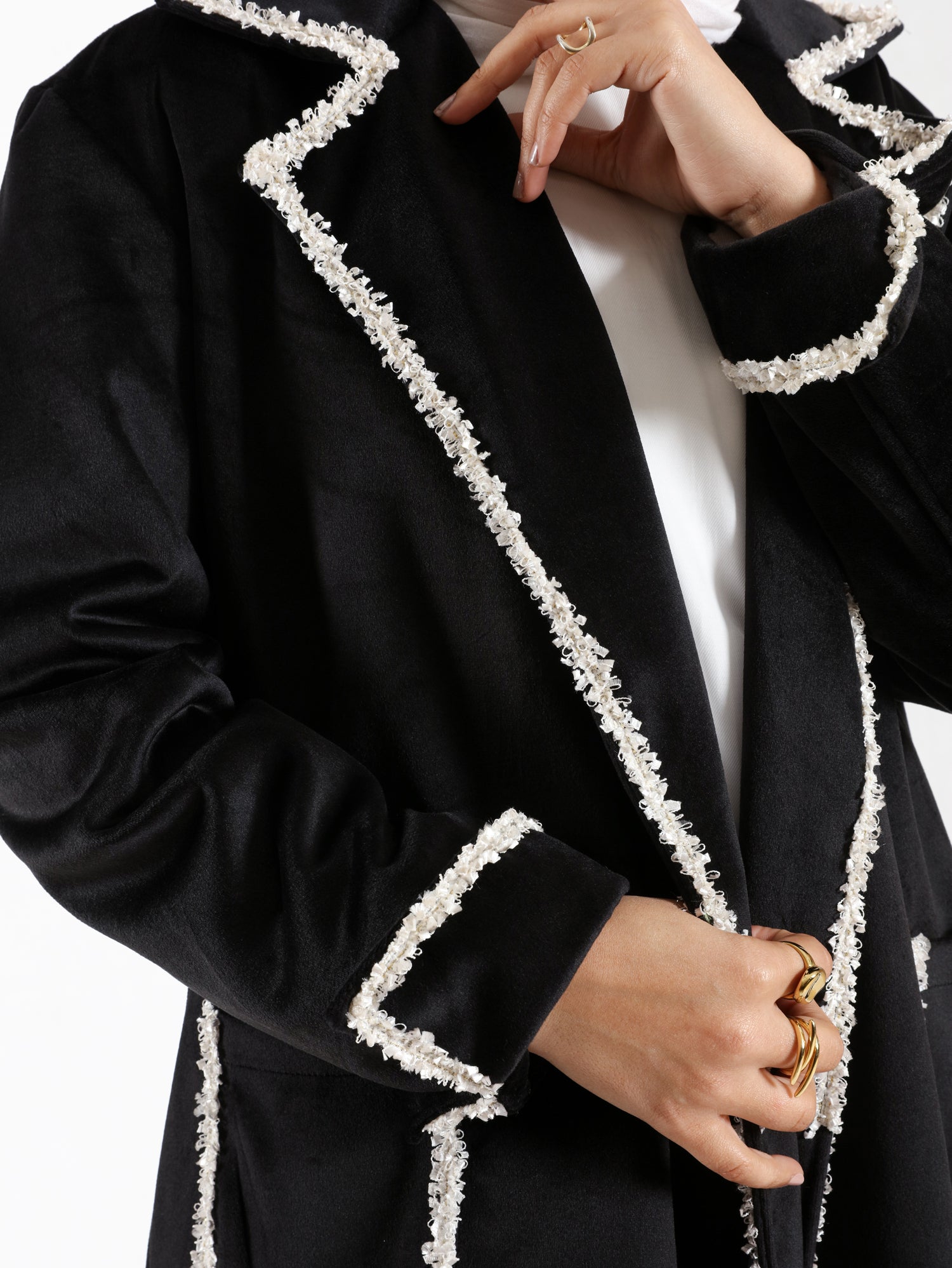 Elegant Suede Coat in black wool with engraved stitching, a long modest winter coat blending warmth, sophistication, and timeless style