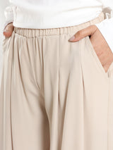 Floret Twirl Pants in airy viscose blend with wide-leg cut and high-rise waist, a breezy summer staple in turquoise, black, or beige