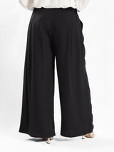 Floret Twirl Pants in breezy viscose blend with flowy wide-leg silhouette and high-rise waist, designed for modest summer comfort