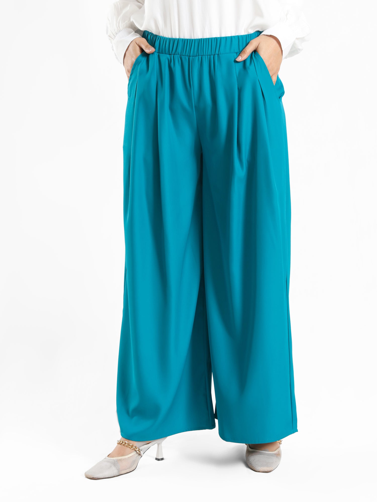 Floret Twirl Pants in wide-leg fit, available in turquoise, black, and beige—lightweight and modest for summer styling