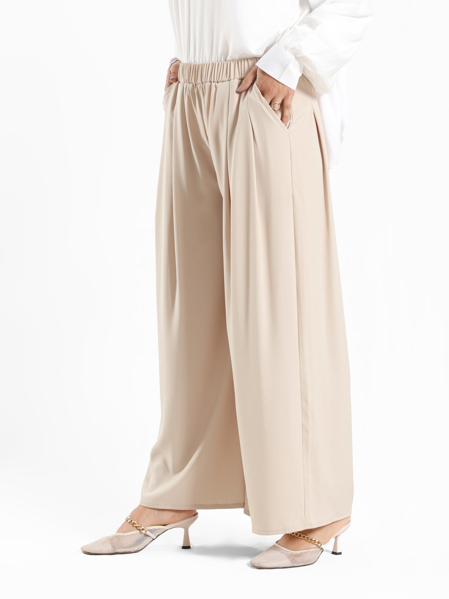 Floret Twirl Pants in airy viscose blend with wide-leg cut and high-rise waist, a breezy summer staple in turquoise, black, or beige