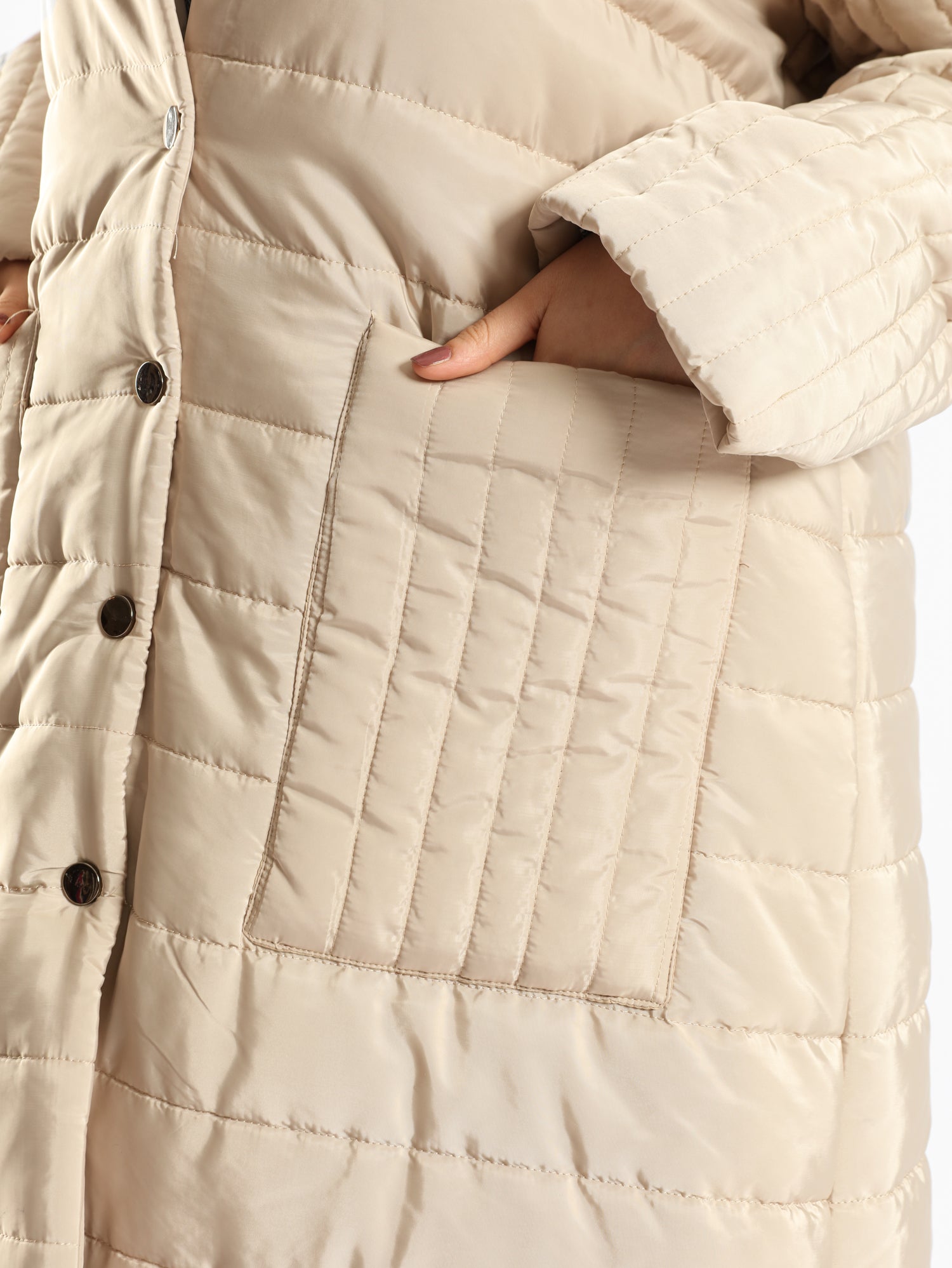 Long waterproof puffer coat with quilted texture and full coverage, ideal for modest winter wear in navy, beige, or grey