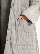 Long waterproof puffer coat with quilted texture and full coverage, ideal for modest winter wear in navy, beige, or grey