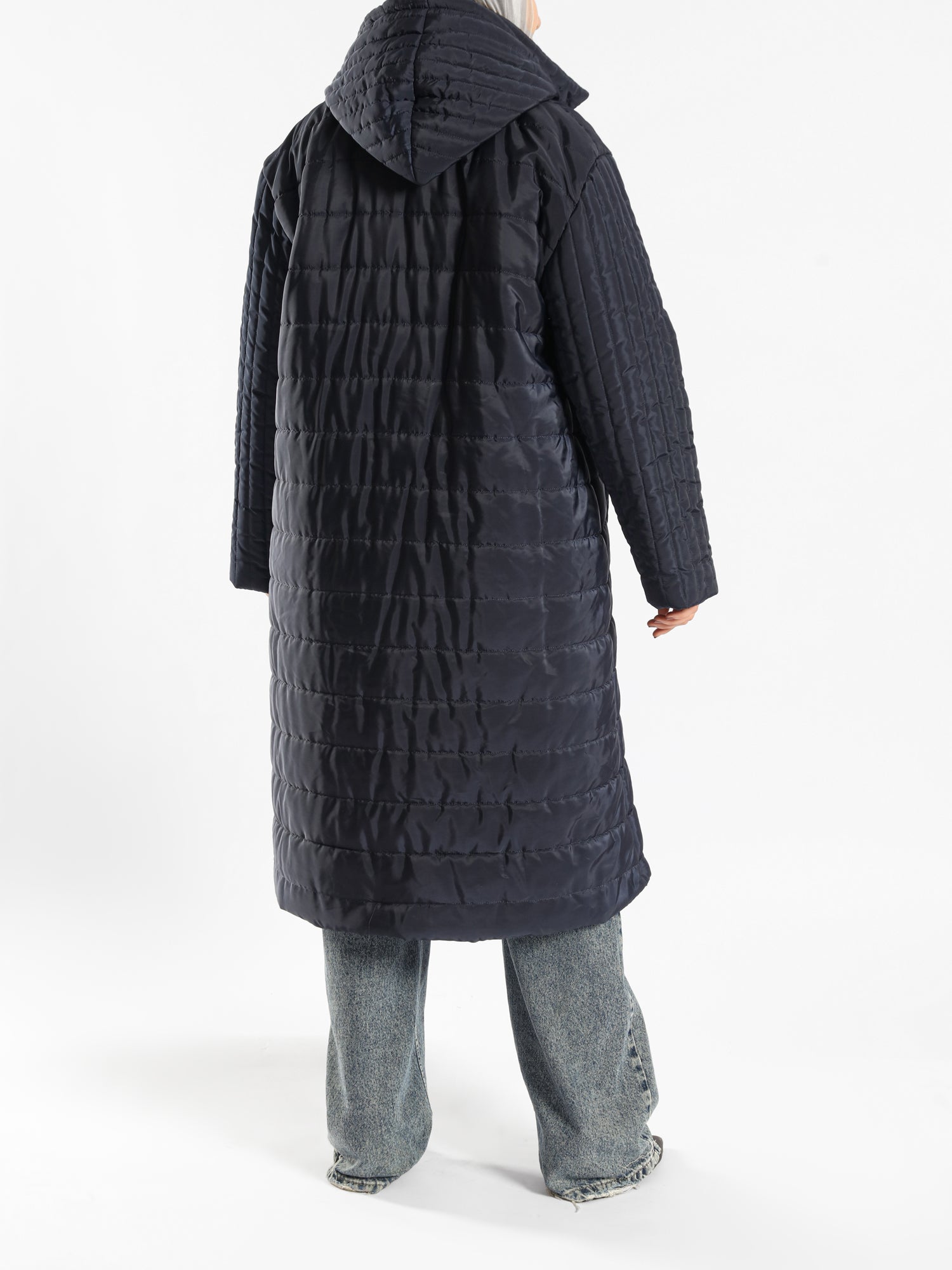 Long waterproof puffer coat with quilted texture and full coverage, ideal for modest winter wear in navy, beige, or grey