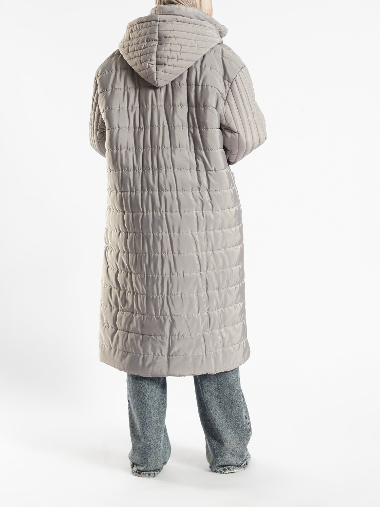 Long waterproof puffer coat with quilted texture and full coverage, ideal for modest winter wear in navy, beige, or grey