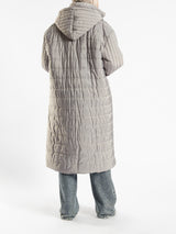Long waterproof puffer coat with quilted texture and full coverage, ideal for modest winter wear in navy, beige, or grey