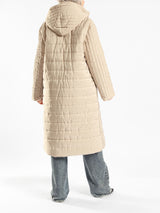 Long waterproof puffer coat with quilted texture and full coverage, ideal for modest winter wear in navy, beige, or grey