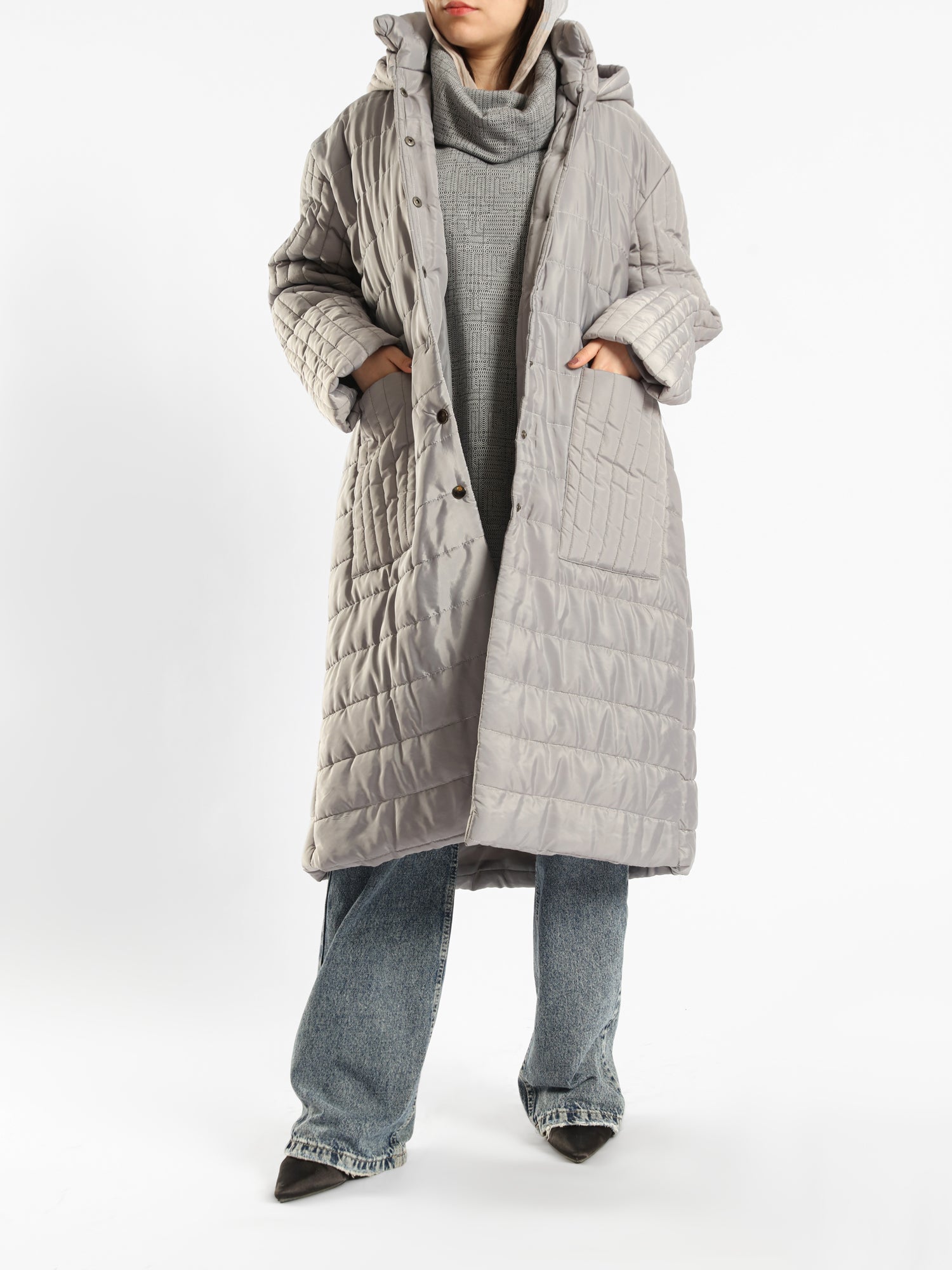 Long waterproof puffer coat with quilted texture and full coverage, ideal for modest winter wear in navy, beige, or grey