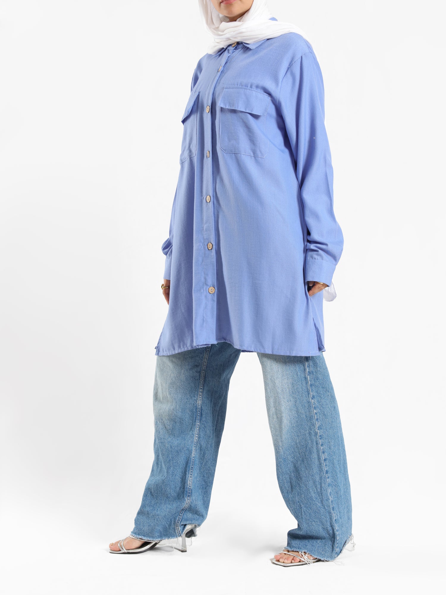 Petal Pocket Blouse in linen blend with front pockets, a relaxed-fit modest top in baby blue, mauve, or white for summer wear