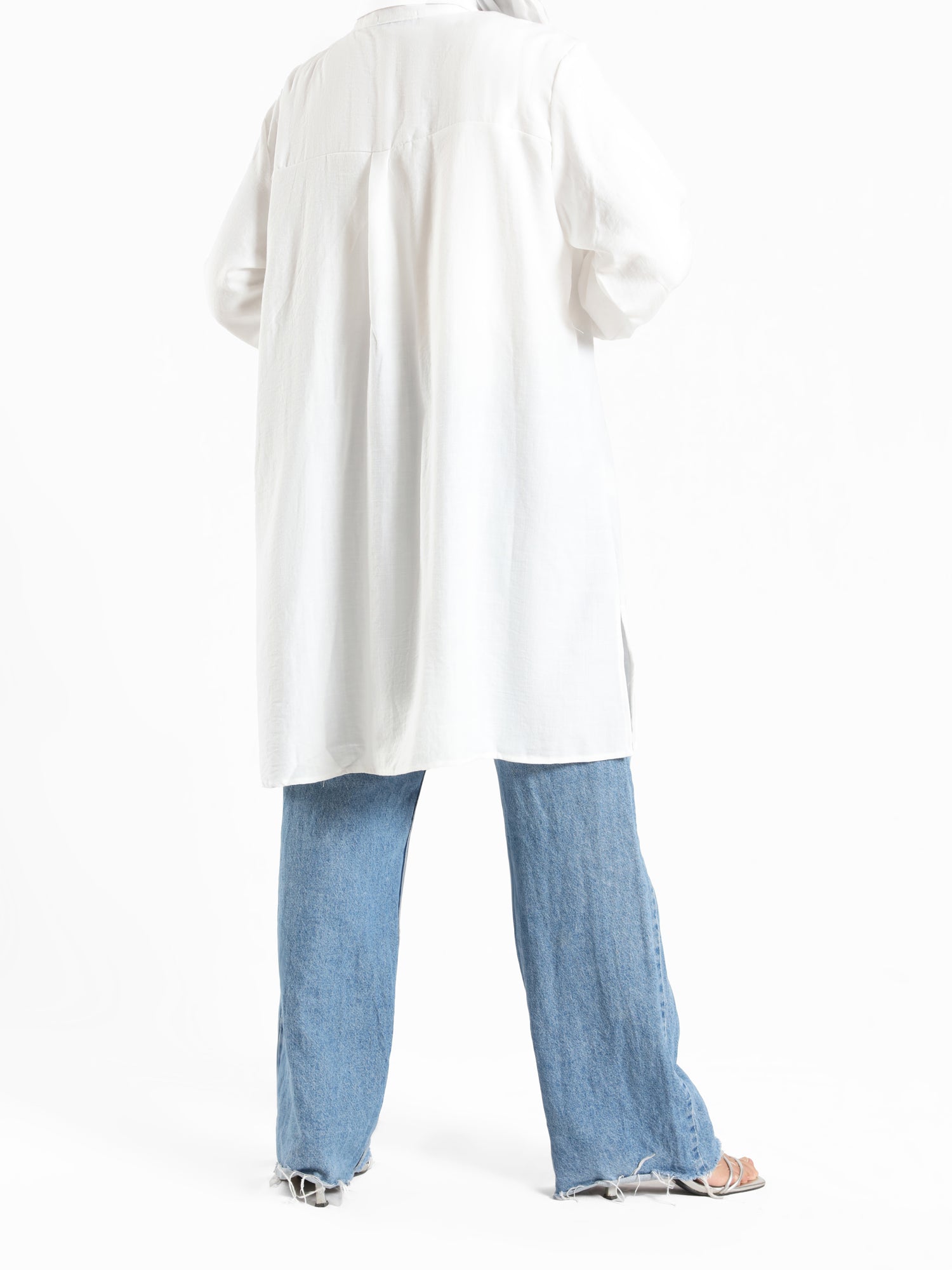 Petal Pocket Blouse in linen blend with front pockets, a relaxed-fit modest top in baby blue, mauve, or white for summer wear