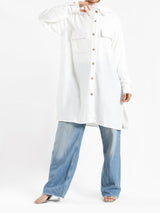 Petal Pocket Blouse in linen blend with front pockets, a relaxed-fit modest top in baby blue, mauve, or white for summer wear