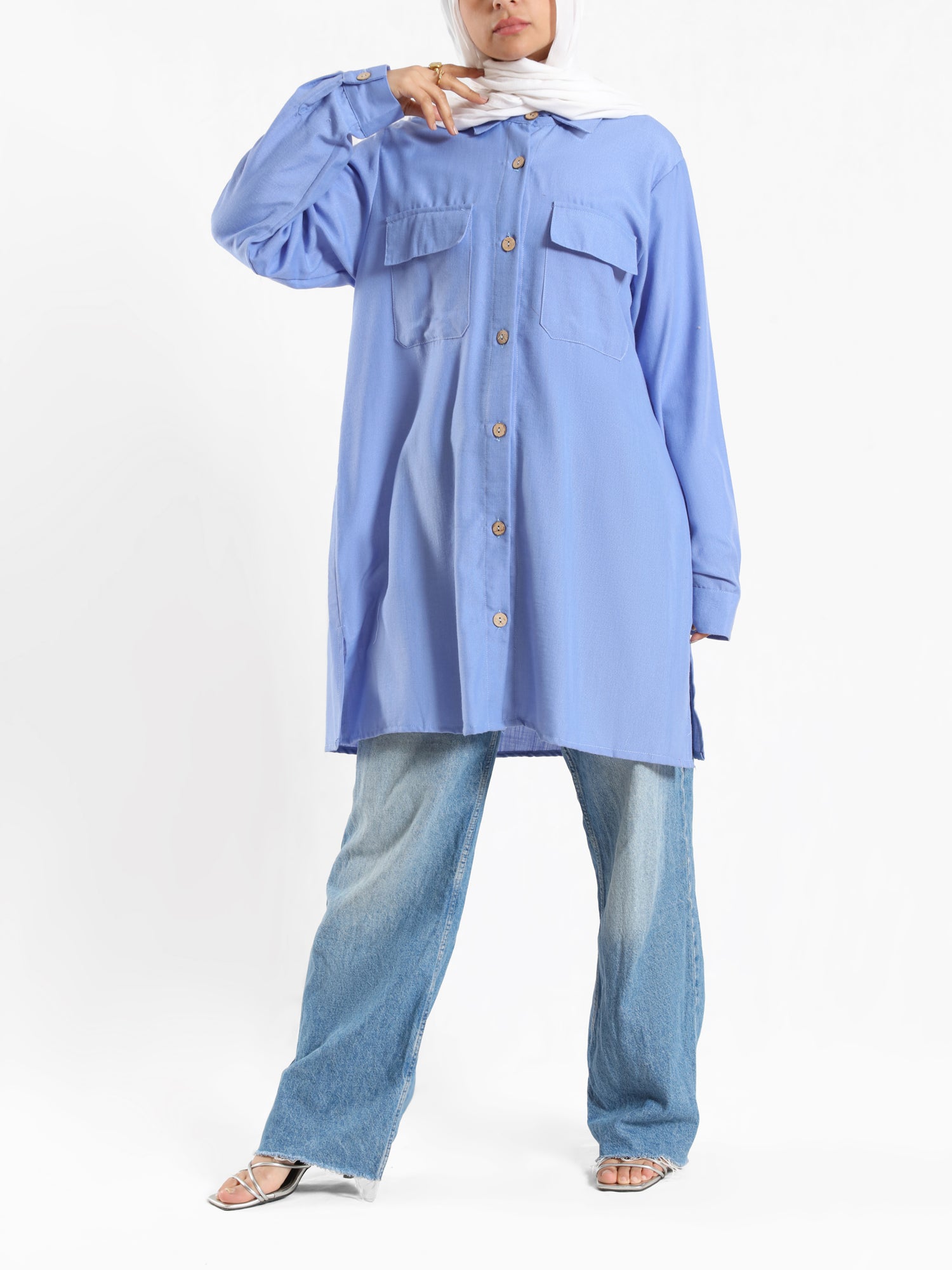 Petal Pocket Blouse in linen blend with front pockets, a relaxed-fit modest top in baby blue, mauve, or white for summer wear